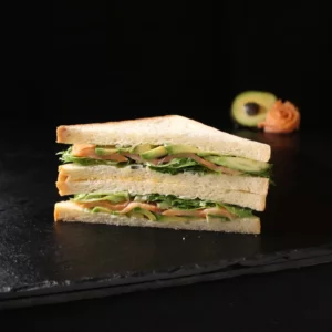 Salmon & avocado soft white bread sandwich